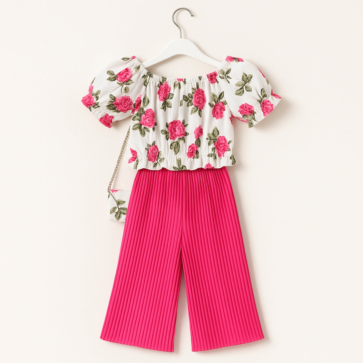 Meisjes set met rozenprint top en roze plissé broek – inclusief schoudertasje