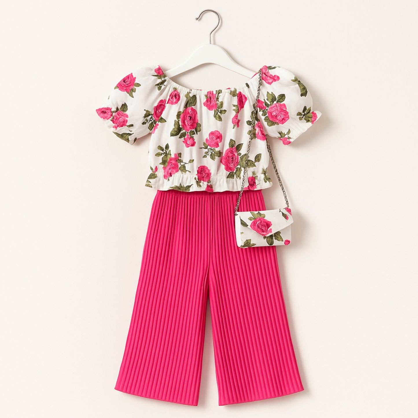 Meisjes set met rozenprint top en roze plissé broek – inclusief schoudertasje
