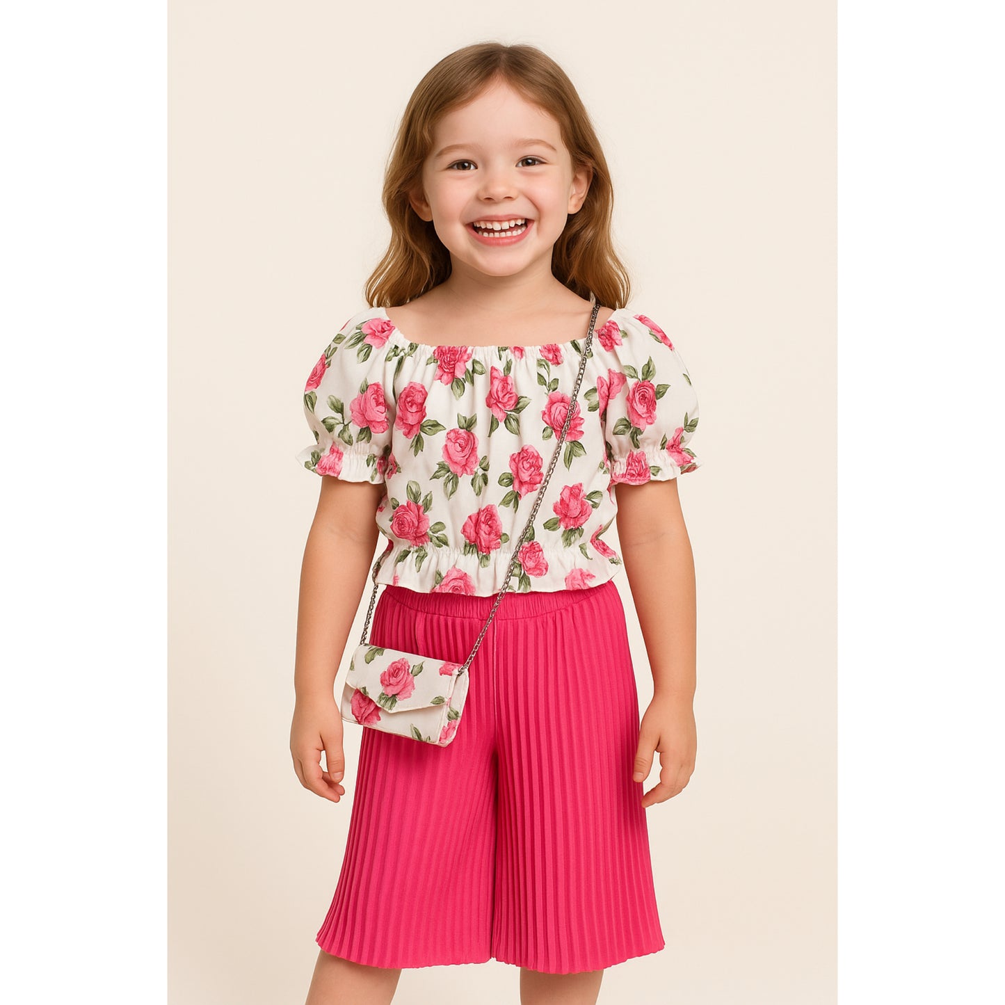 Meisjes set met rozenprint top en roze plissé broek – inclusief schoudertasje