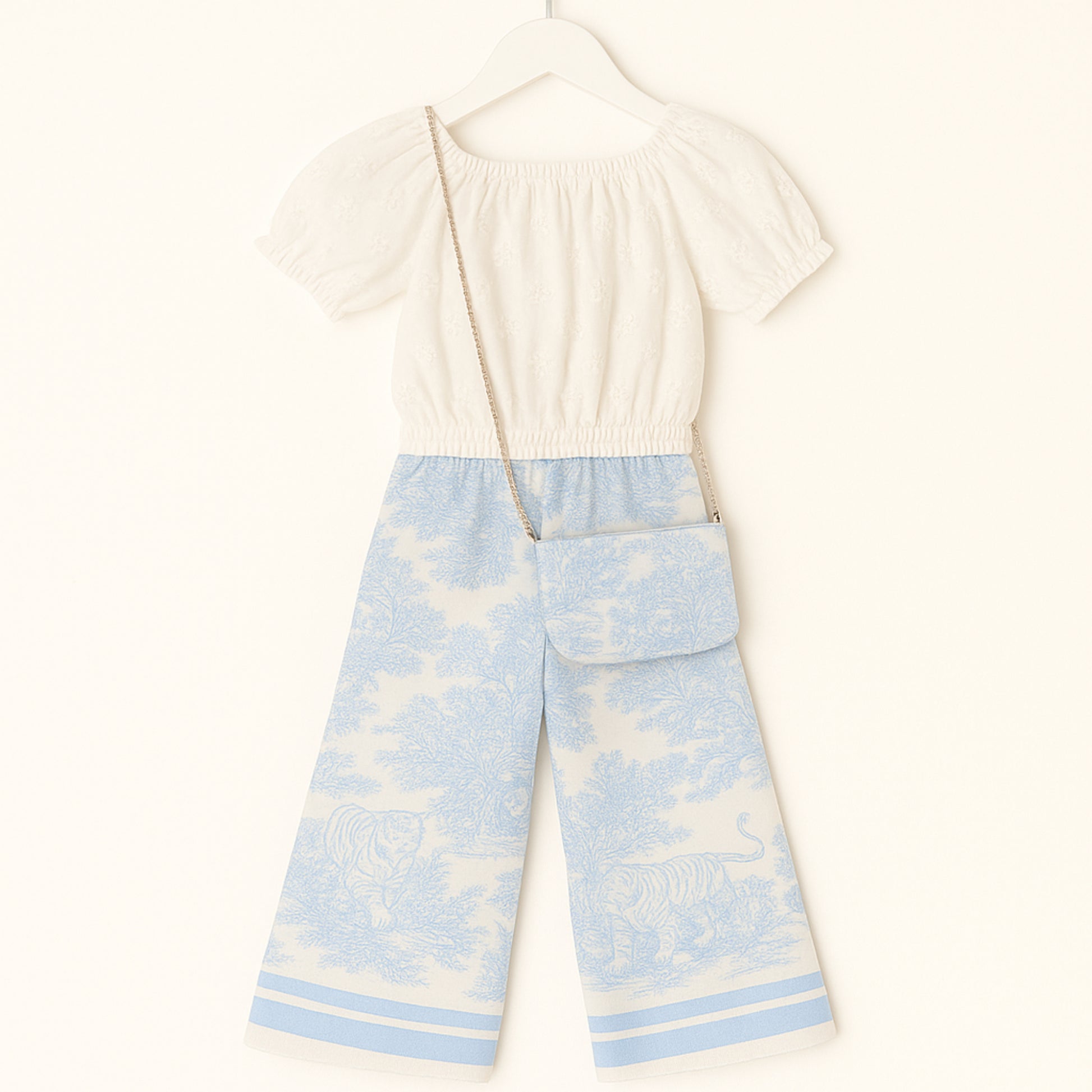 Meisjes set met witte top en blauwe printbroek – inclusief schoudertasje