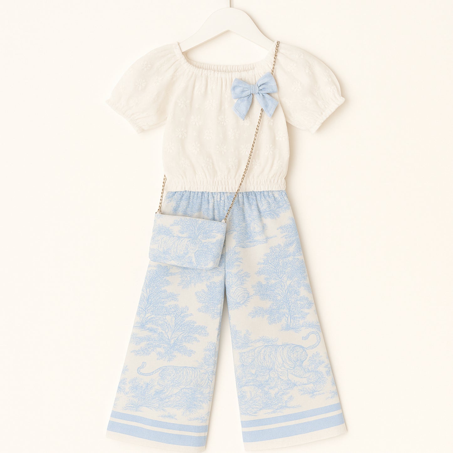 Meisjes set met witte top en blauwe printbroek – inclusief schoudertasje