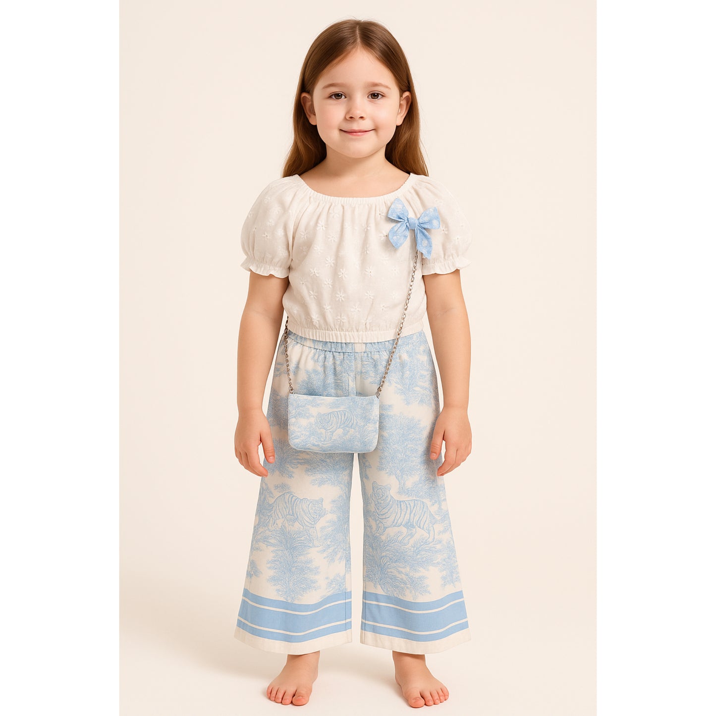 Meisjes set met witte top en blauwe printbroek – inclusief schoudertasje