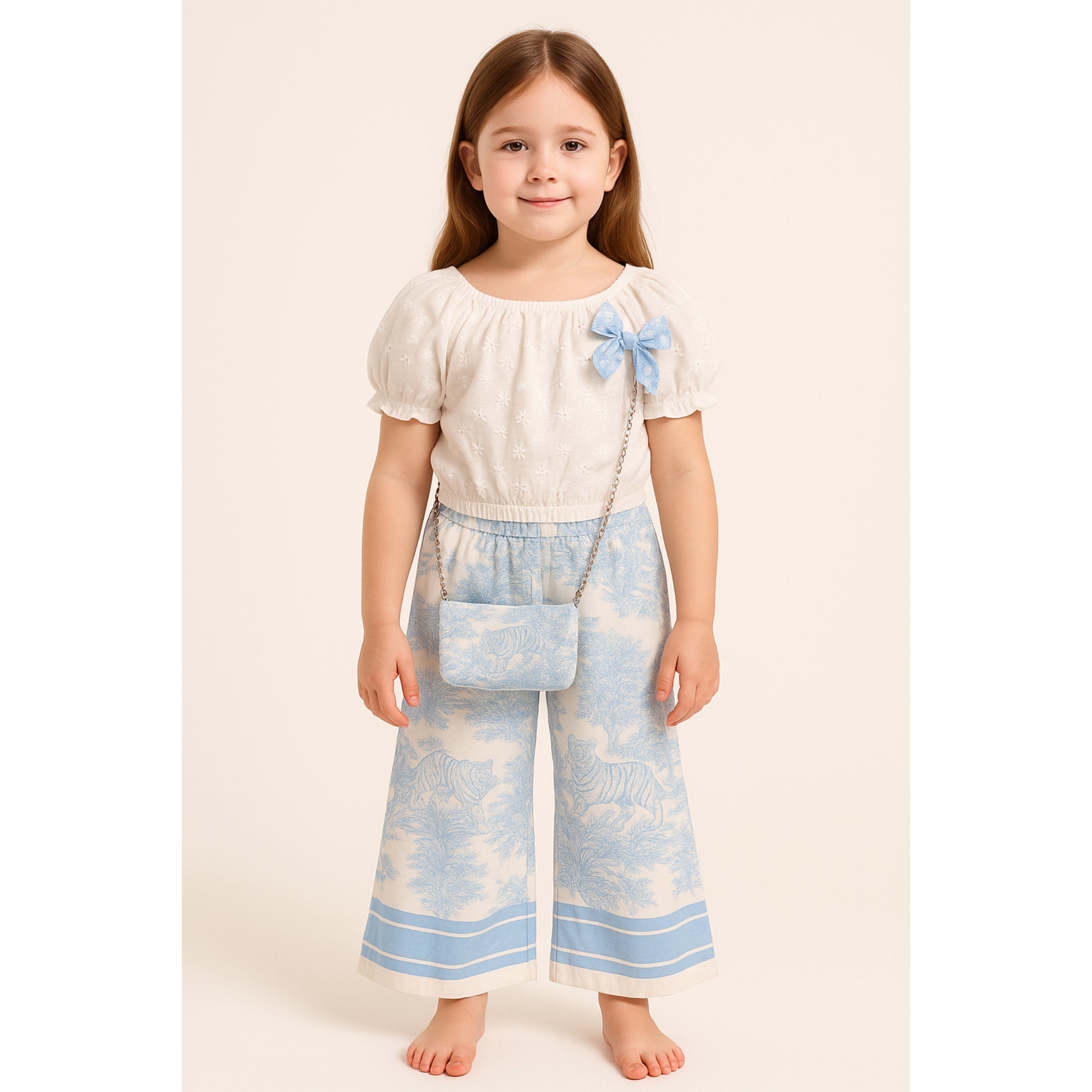 Meisjes set met witte top en blauwe printbroek – inclusief schoudertasje