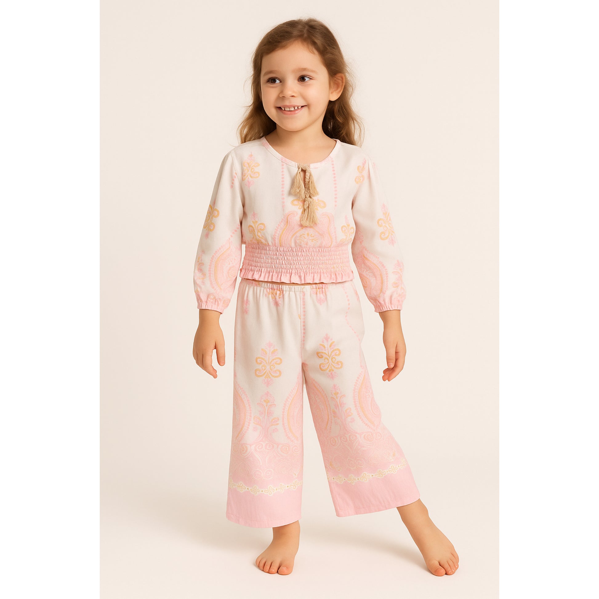 Meisjes set met roze-oranje print – top met lange mouwen en wijde broek