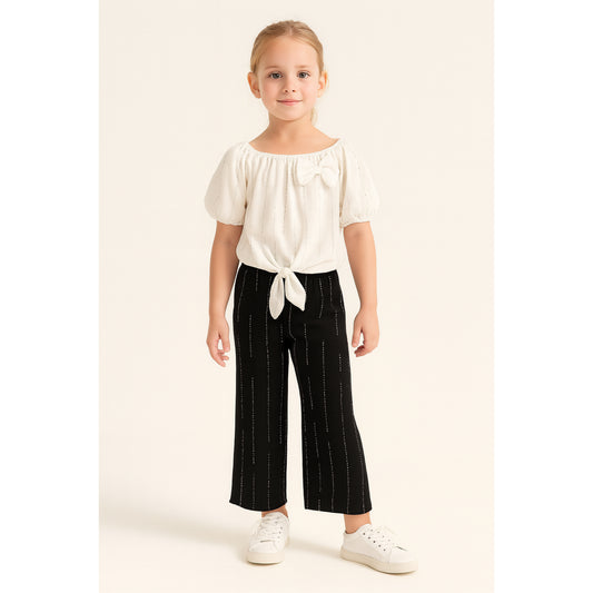 Meisjes set met off-shoulder top en zwarte broek – comfortabel en trendy