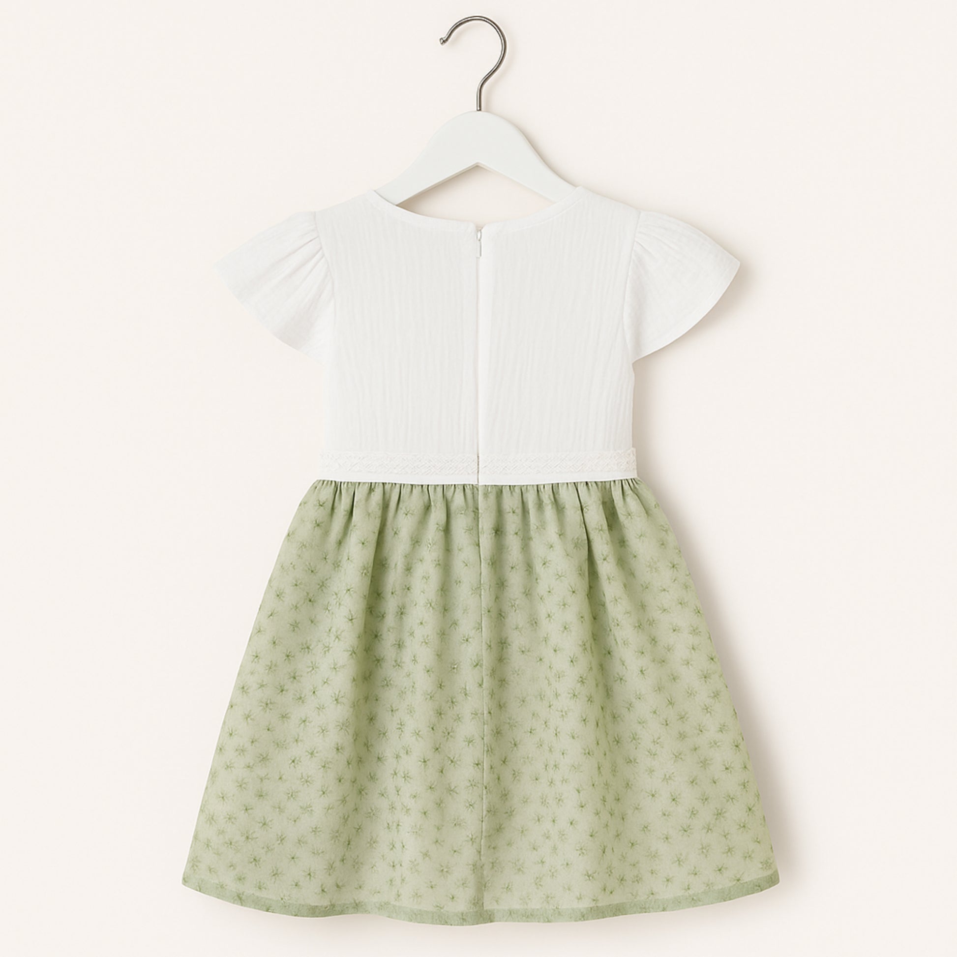Meisjes groene jurk met witte top en strikdetail