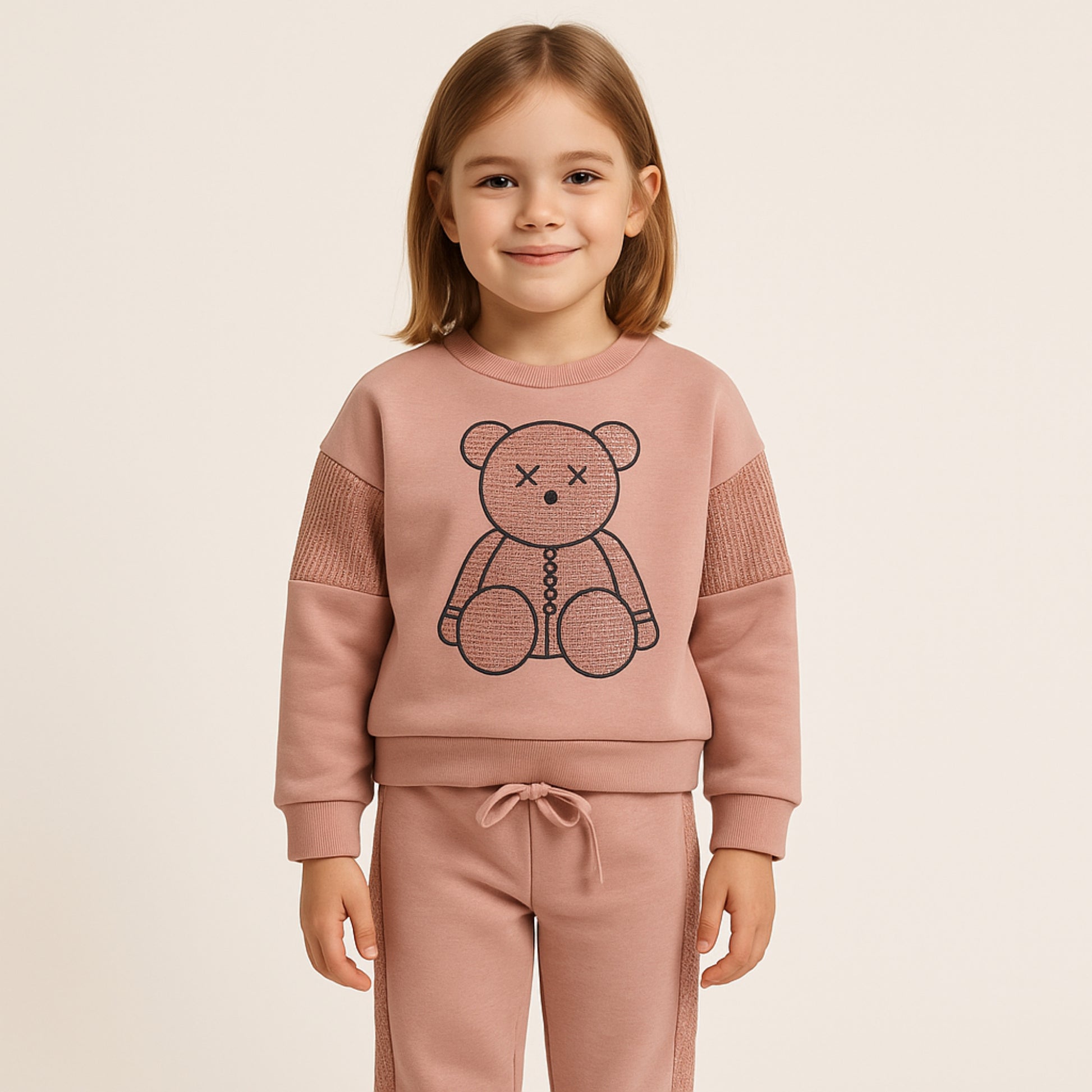 Meisjes trainingspak met teddybeer print – roze sweatshirt en broek met glitterdetails