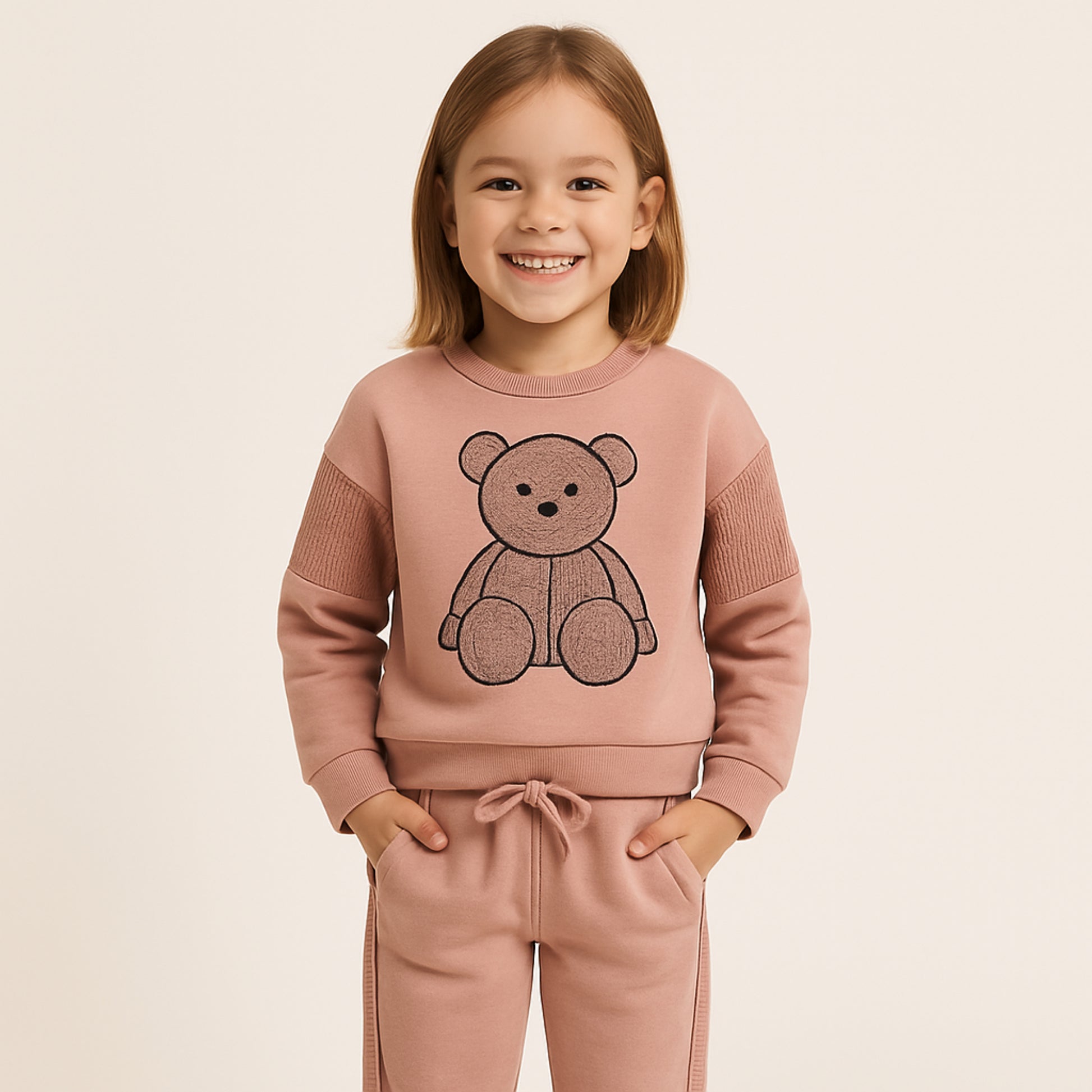 Meisjes trainingspak met teddybeer print – roze sweatshirt en broek met glitterdetails