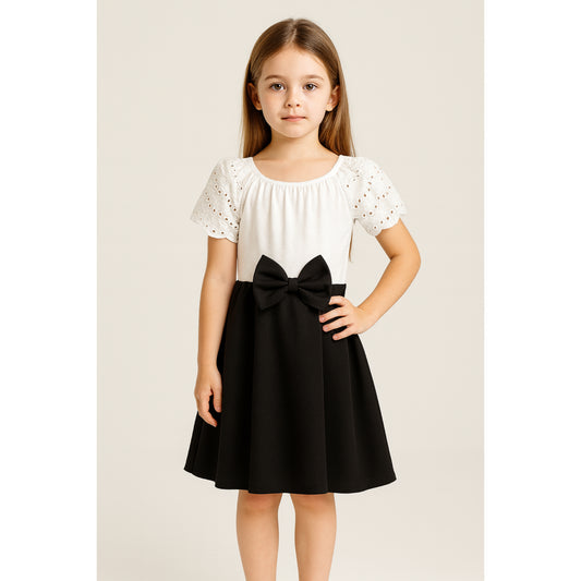 Meisjes jurk met strik – wit top en zwarte rok met strikdetail