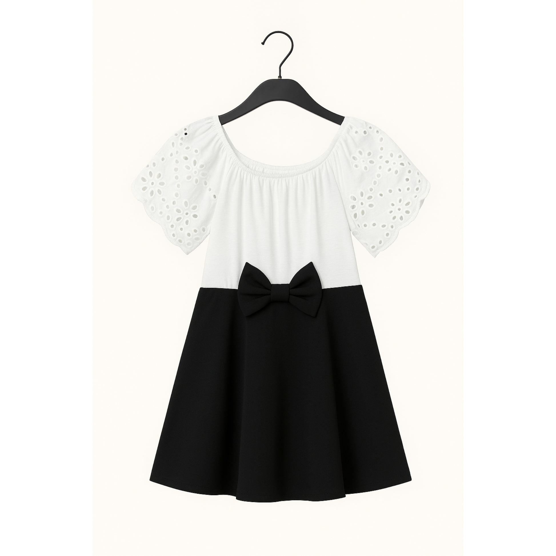 Meisjes jurk met strik – wit top en zwarte rok met strikdetail